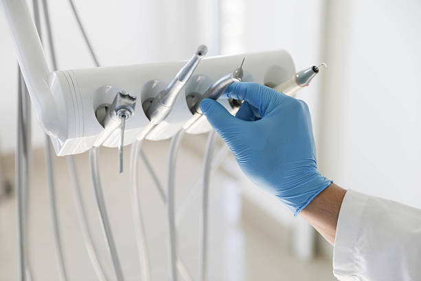 Professional Tooth Extraction technician working in Braddock, VA